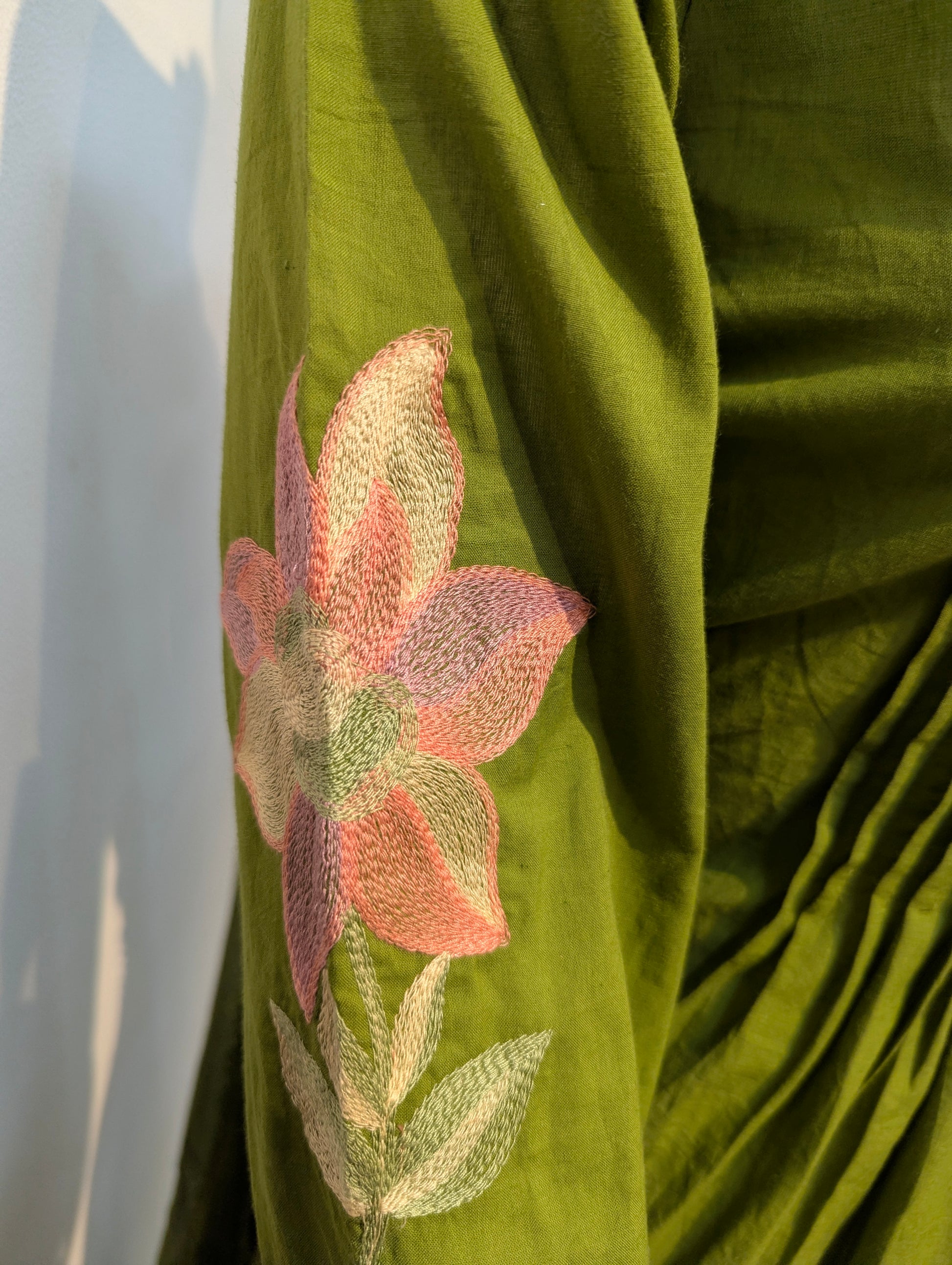 Elegant green women’s kurti in Indo-Western style, perfect for festive and traditional occasions