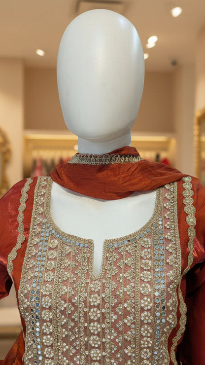 Floral embroidered sleeve detail on orange cotton kurti for women