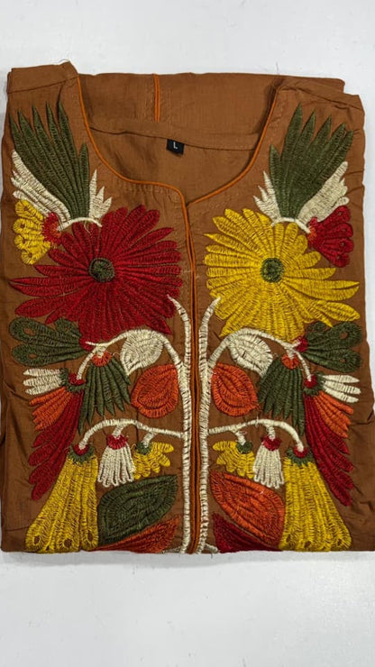 Two folded fabric pieces with floral embroidery on a white background